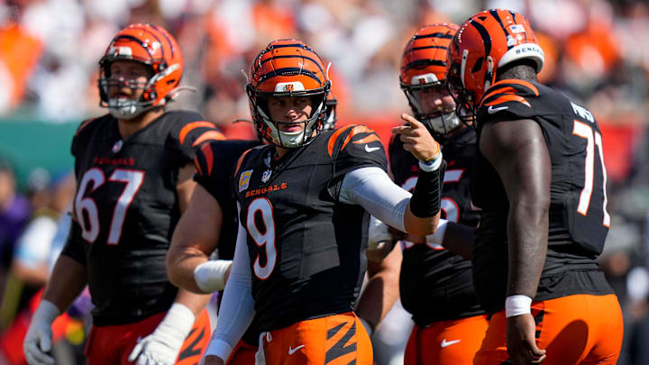 Cincinnati Bengals quarterback Joe Burrow (9) looks back to the sideline from the huddle in the second quarter of the NFL Week 5 game between the Cincinnati Bengals and Baltimore Ravens at Paycor Stadium in downtown Cincinnati on Sunday, Oct. 6, 2024.  
