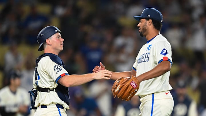 Jun 22, 2024; Los Angeles, California, USA; Los Angeles Dodgers pitcher Michael Petersen (90) and catcher Will Smith (16) celebrate after defeating the Los Angeles Angels during the ninth inning at Dodger Stadium. Mandatory Credit: Jonathan Hui-Imagn Images Jun 22, 2024; Los Angeles, California, USA; Los Angeles Dodgers pitcher Michael Petersen (90) and catcher Will Smith (16) celebrate after defeating the Los Angeles Angels during the ninth inning at Dodger Stadium. Mandatory Credit: Jonathan Hui-Imagn Images
