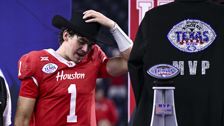 Dec 27, 2025; Houston, TX, USA; Houston Cougars quarterback Conner Weigman (1) puts on the MVP cowboy hat after the win over Louisiana State Tigers at NRG Stadium. Mandatory Credit: Maria Lysaker-Imagn Images Dec 27, 2025; Houston, TX, USA; Houston Cougars quarterback Conner Weigman (1) puts on the MVP cowboy hat after the win over Louisiana State Tigers at NRG Stadium. Mandatory Credit: Maria Lysaker-Imagn Images