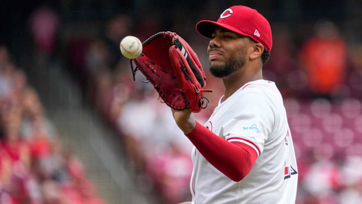 Cincinnati Reds pitcher Hunter Greene (21) collects a new ball after giving up a solo home run to Pittsburgh Pirates center fielder Oneil Cruz (15) in the first inning of the MLB National League Game between the Cincinnati Reds and the Pittsburgh Pirates at Great American Ball Park in downtown Cincinnati on Sunday, Sept. 22, 2024. The Pirates led 1-0 after four innings. Cincinnati Reds pitcher Hunter Greene (21) collects a new ball after giving up a solo home run to Pittsburgh Pirates center fielder Oneil Cruz (15) in the first inning of the MLB National League Game between the Cincinnati Reds and the Pittsburgh Pirates at Great American Ball Park in downtown Cincinnati on Sunday, Sept. 22, 2024. The Pirates led 1-0 after four innings.