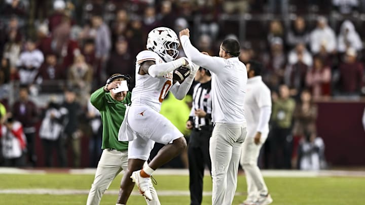 Nov 30, 2024; College Station, Texas, USA; Texas Longhorns linebacker Anthony Hill Jr. (0) reacts after recovering a fumble during the fourth quarter against the Texas A&M Aggies. The Longhorns defeated the Aggies 17-7. at Kyle Field. Mandatory Credit: Maria Lysaker-Imagn Images Nov 30, 2024; College Station, Texas, USA; Texas Longhorns linebacker Anthony Hill Jr. (0) reacts after recovering a fumble during the fourth quarter against the Texas A&M Aggies. The Longhorns defeated the Aggies 17-7. at Kyle Field. Mandatory Credit: Maria Lysaker-Imagn Images