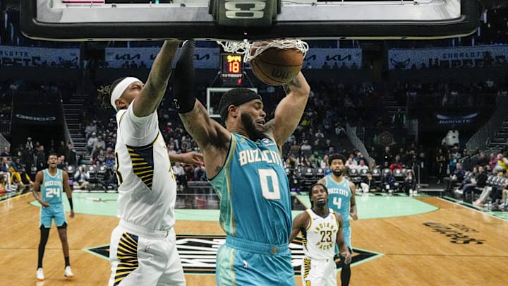 Feb 4, 2024; Charlotte, North Carolina, USA; Charlotte Hornets forward Miles Bridges (0) dunks