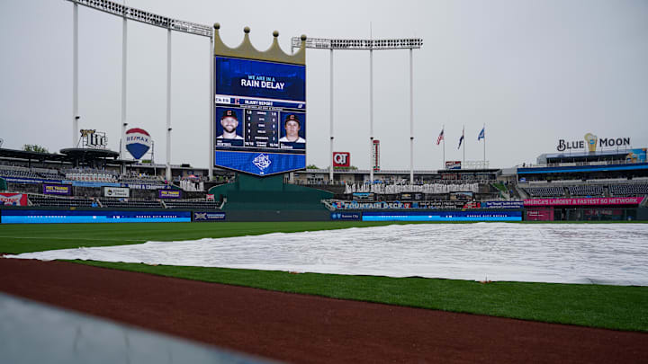 May 5, 2024; Kansas City, Missouri, USA; A general view of the tarp-covered infield as the Kansas City Royals and Texas Rangers game is in a rain delay at Kauffman Stadium. Mandatory Credit: Denny Medley-Imagn Images