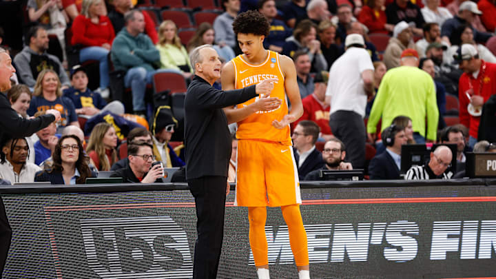 Mar 27, 2026; Chicago, IL, USA; Tennessee Volunteers forward Nate Ament (10) speaks with head coach Rick Barnes in the second half against the Iowa State Cyclones during a Sweet Sixteen game of the Midwest Regional of the men's 2026 NCAA Tournament at United Center. Mandatory Credit: Kamil Krzaczynski-Imagn Images Mar 27, 2026; Chicago, IL, USA; Tennessee Volunteers forward Nate Ament (10) speaks with head coach Rick Barnes in the second half against the Iowa State Cyclones during a Sweet Sixteen game of the Midwest Regional of the men's 2026 NCAA Tournament at United Center. Mandatory Credit: Kamil Krzaczynski-Imagn Images