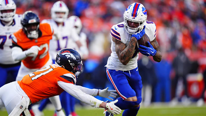 Buffalo Bills wide receiver Keon Coleman (0) scores a touchdown against Denver Broncos cornerback Riley Moss (21).