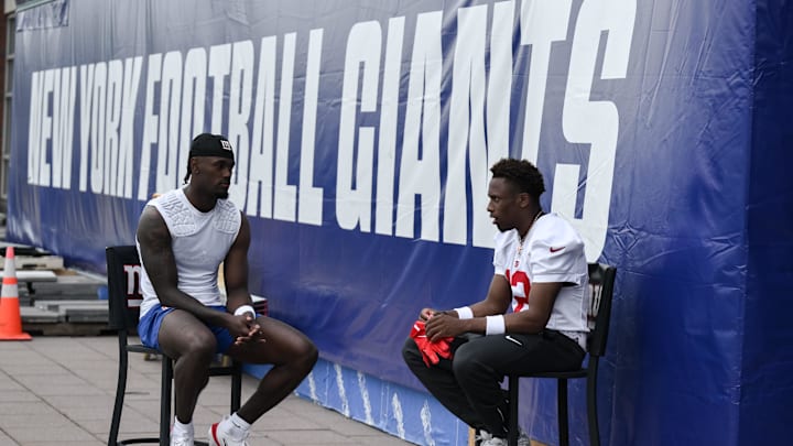 May 9, 2026; East Rutherford, NJ, USA; New York Giants wide receiver Malachi Fields (0) and cornerback Colton Hood (12) chat after rookie minicamp at Quest Diagnostics Training Center.  