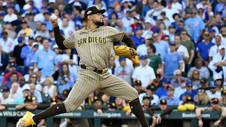 Oct 1, 2025; Chicago, Illinois, USA; San Diego Padres pitcher Robert Suarez (75) delivers during game two of the Wildcard round for the 2025 MLB playoffs at Wrigley Field. Mandatory Credit: Matt Marton-Imagn Images Oct 1, 2025; Chicago, Illinois, USA; San Diego Padres pitcher Robert Suarez (75) delivers during game two of the Wildcard round for the 2025 MLB playoffs at Wrigley Field. Mandatory Credit: Matt Marton-Imagn Images
