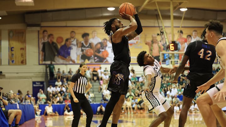 Nov 26, 2024; Lahaina, Hawaii, USA; Memphis Tigers guard Tyrese Hunter (11) shoots over Michigan State Spartans guard Jaden Akins (3) during the first half at Lahaina Civic Center. Mandatory Credit: Marco Garcia-Imagn Images Nov 26, 2024; Lahaina, Hawaii, USA; Memphis Tigers guard Tyrese Hunter (11) shoots over Michigan State Spartans guard Jaden Akins (3) during the first half at Lahaina Civic Center. Mandatory Credit: Marco Garcia-Imagn Images