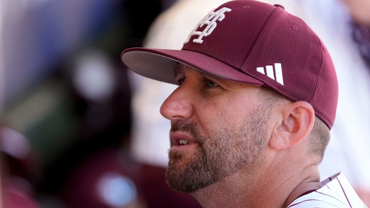 May 21, 2025; Hoover, AL, USA; Mississippi State interim head coach Justin Parker talks to one of his players between innings during the game with Texas A&M in the first round of the SEC Baseball Tournament at the Hoover Met.