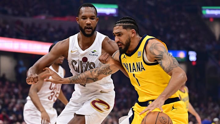May 4, 2025; Cleveland, Ohio, USA; Indiana Pacers forward Obi Toppin (1) drives to the basket against Cleveland Cavaliers forward Evan Mobley (4) during the first half in game one of the second round for the 2025 NBA Playoffs at Rocket Arena. Mandatory Credit: Ken Blaze-Imagn Images