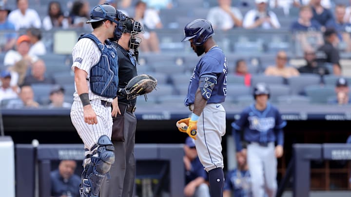 Tampa Bay Rays left fielder Randy Arozarena (56) reacts after being hit by a pitch during the ninth inning against the New York Yankees at Yankee Stadium in 2024.