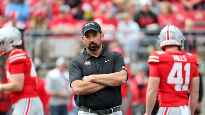 Sep 6, 2025; Columbus, Ohio, USA;  Ohio State Buckeyes head coach Ryan Day watches warmups before a game against the Grambling State Tigers at Ohio Stadium. Mandatory Credit: Joseph Maiorana-Imagn Images