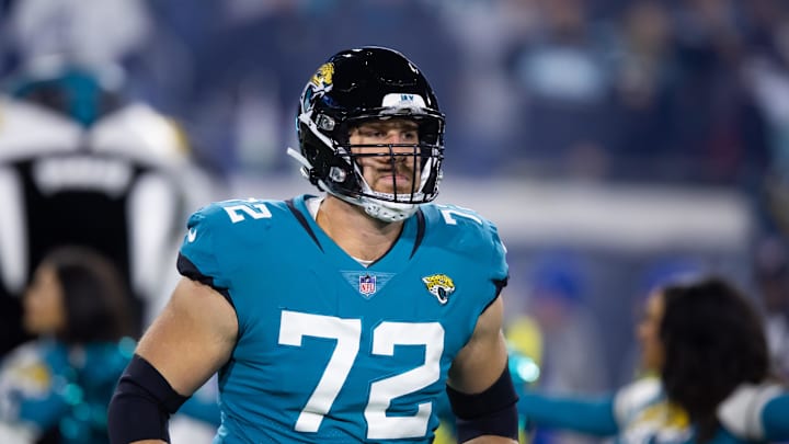 Jan 14, 2023; Jacksonville, Florida, USA; Jacksonville Jaguars offensive tackle Walker Little (72) against the Los Angeles Chargers during a wild card playoff game at TIAA Bank Field. Mandatory Credit: Mark J. Rebilas-Imagn Images