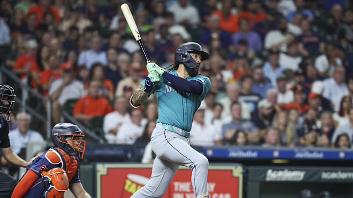 Seattle Mariners shortstop J.P. Crawford (3) hits a single during the seventh inning against the Houston Astros at Minute Maid Park in 2024. Seattle Mariners shortstop J.P. Crawford (3) hits a single during the seventh inning against the Houston Astros at Minute Maid Park in 2024.