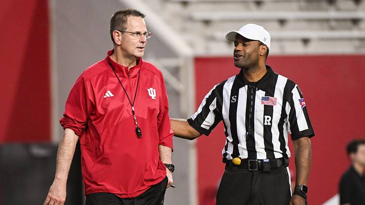 Indiana Hoosiers head coach Curt Cignetti talks with a referee during the Indiana football spring game at Memorial Stadium on Thursday, April 18, 2024.