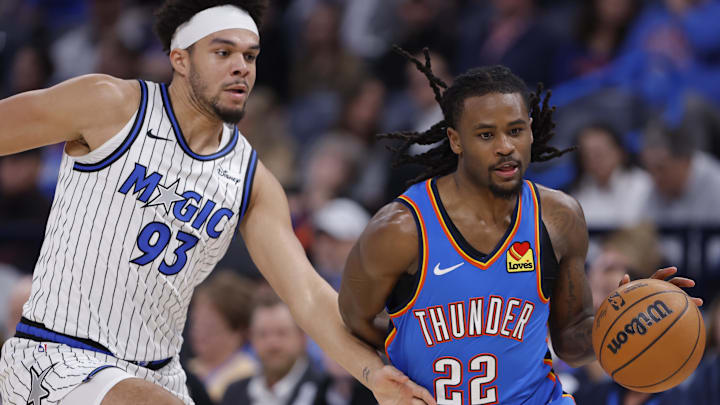 Feb 3, 2026; Oklahoma City, Oklahoma, USA; Orlando Magic guard/forward Noah Penda (93) defends a drive by Oklahoma City Thunder guard Shai Gilgeous-Alexander (2) during the second half at Paycom Center. Mandatory Credit: Alonzo Adams-Imagn Images Feb 3, 2026; Oklahoma City, Oklahoma, USA; Orlando Magic guard/forward Noah Penda (93) defends a drive by Oklahoma City Thunder guard Shai Gilgeous-Alexander (2) during the second half at Paycom Center. Mandatory Credit: Alonzo Adams-Imagn Images