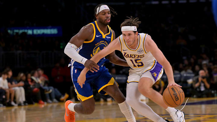 Oct 12, 2025; Los Angeles, California, USA; Los Angeles Lakers guard Austin Reaves (15) drives past Golden State Warriors guard Buddy Hield (7) during the first half at Crypto.com Arena. Mandatory Credit: Jayne Kamin-Oncea-Imagn Images Oct 12, 2025; Los Angeles, California, USA; Los Angeles Lakers guard Austin Reaves (15) drives past Golden State Warriors guard Buddy Hield (7) during the first half at Crypto.com Arena. Mandatory Credit: Jayne Kamin-Oncea-Imagn Images