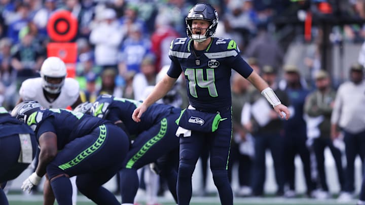 Nov 9, 2025; Seattle, Washington, USA; Seattle Seahawks quarterback Sam Darnold (14) calls a play during the first quarter against the Arizona Cardinals at Lumen Field. Mandatory Credit: Kevin Ng-Imagn Images