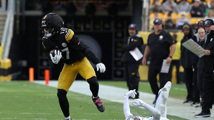 Oct 11, 2026; Pittsburgh, Pennsylvania, USA;  Pittsburgh Steelers wide receiver Germie Bernard (17) runs with the ball after a catch while defneded by Indianapolis Colts safety Cam Bynum (0) in the fourth quarter at Acrisure Stadium.  Mandatory Credit: Charles LeClaire-Imagn Images