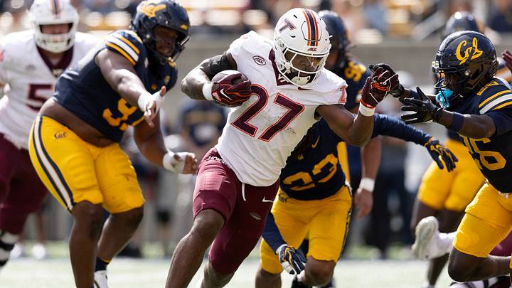 Oct 10, 2026; Berkeley, California, USA; Virginia Tech Hokies running back Marcellous Hawkins Jr. (27) looks for running room against the California Golden Bears defense during the second quarter at California Memorial Stadium. Mandatory Credit: D. Ross Cameron-Imagn Images Oct 10, 2026; Berkeley, California, USA; Virginia Tech Hokies running back Marcellous Hawkins Jr. (27) looks for running room against the California Golden Bears defense during the second quarter at California Memorial Stadium. Mandatory Credit: D. Ross Cameron-Imagn Images