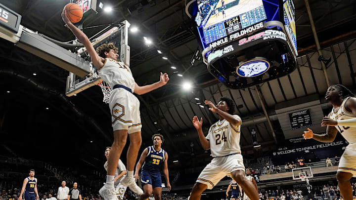 UC Irvine Anteaters forward Kyle Evans (14) throws the ball back in bounds to UC Irvine Anteaters guard Jurian Dixon (24) on Thursday, April 3, 2025, during the National Invitational Tournament at Hinkle Fieldhouse in Indianapolis.