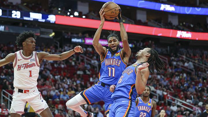 Feb 25, 2024; Houston, Texas, USA; Oklahoma City Thunder guard Isaiah Joe (11) grabs a rebound during the first quarter against the Houston Rockets at Toyota Center. Mandatory Credit: Troy Taormina-Imagn Images Feb 25, 2024; Houston, Texas, USA; Oklahoma City Thunder guard Isaiah Joe (11) grabs a rebound during the first quarter against the Houston Rockets at Toyota Center. Mandatory Credit: Troy Taormina-Imagn Images