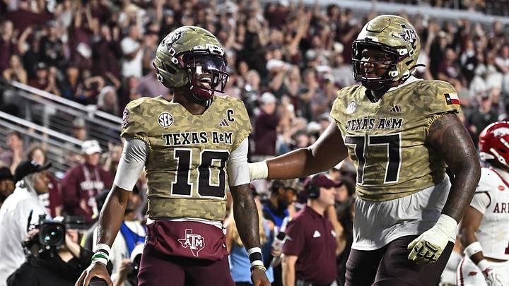 Oct 3, 2026; College Station, Texas, USA; Texas A&M Aggies quarterback Marcel Reed (10) celebrates after scoreing a touchdown during the second quarter against the Arkansas Razorbacks at Kyle Field. Mandatory Credit: Maria Lysaker-Imagn Images