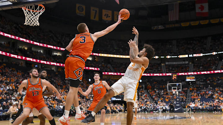Dec 6, 2025; Nashville, Tennessee, USA;  Illinois Fighting Illini forward Ben Humrichous (3) blocks the shot of  Tennessee Volunteers guard Ja'Kobi Gillespie (0) during the first half at Bridgestone Arena. Mandatory Credit: Steve Roberts-Imagn Images