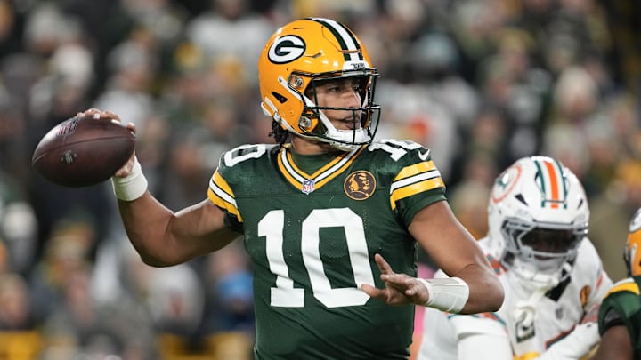 Nov 28, 2024; Green Bay, Wisconsin, USA;  Green Bay Packers quarterback Jordan Love (10) throws a pass during the first quarter against the Miami Dolphins at Lambeau Field. Mandatory Credit: Jeff Hanisch-Imagn Images