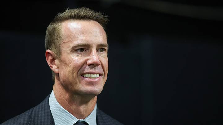 Oct 3, 2024; Atlanta, Georgia, USA; Former Atlanta Falcons quarterback Matt Ryan (2) on the sideline before being inducted in the team’s ring of honor at halftime of a game against the Tampa Bay Buccaneers at Mercedes-Benz Stadium. Mandatory Credit: Brett Davis-Imagn Images