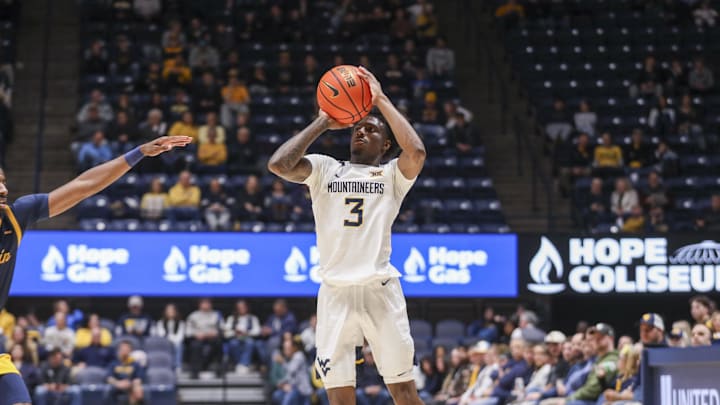 Dec 3, 2025; Morgantown, West Virginia, USA; West Virginia Mountaineers guard Honor Huff (3) shoots a three pointer during the second half against the Coppin State Eagles at Hope Coliseum. Mandatory Credit: Ben Queen-Imagn Images Dec 3, 2025; Morgantown, West Virginia, USA; West Virginia Mountaineers guard Honor Huff (3) shoots a three pointer during the second half against the Coppin State Eagles at Hope Coliseum. Mandatory Credit: Ben Queen-Imagn Images