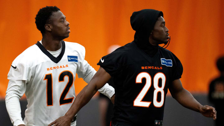 Cincinnati Bengals wide receiver Shedrick Jackson (12) and Cincinnati Bengals cornerback Josh Newton (28) practice together at Bengals spring practice at the IEL Indoor Facility in Cincinnati on Thursday, June 13, 2024. Cincinnati Bengals wide receiver Shedrick Jackson (12) and Cincinnati Bengals cornerback Josh Newton (28) practice together at Bengals spring practice at the IEL Indoor Facility in Cincinnati on Thursday, June 13, 2024.