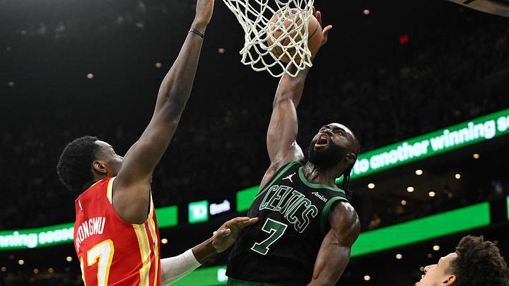 Jan 18, 2025; Boston, Massachusetts, USA; Boston Celtics guard Jaylen Brown (7) attempts a basket against the Atlanta Hawks during the fourth quarter at the TD Garden. Mandatory Credit: Brian Fluharty-Imagn Images