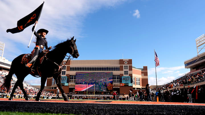 Spirit Rider Avery Langley rides Bullet after a score in the first half of the college football game between the Oklahoma State Cowboys and the Iowa State Cyclones at Boone Pickens Stadium in Stillwater, Okla., Saturday Nov. 29, 2025. Spirit Rider Avery Langley rides Bullet after a score in the first half of the college football game between the Oklahoma State Cowboys and the Iowa State Cyclones at Boone Pickens Stadium in Stillwater, Okla., Saturday Nov. 29, 2025.