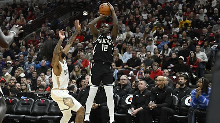 Dec 28, 2024; Chicago, Illinois, USA; Milwaukee Bucks forward Taurean Prince (12) shoots against Chicago Bulls guard Coby White (0) during the second half at the United Center. Mandatory Credit: Matt Marton-Imagn Images Dec 28, 2024; Chicago, Illinois, USA; Milwaukee Bucks forward Taurean Prince (12) shoots against Chicago Bulls guard Coby White (0) during the second half at the United Center. Mandatory Credit: Matt Marton-Imagn Images
