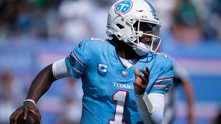 Tennessee quarterback Cam Ward (1) scrambles under New York’s pressure during their season opener at Nissan Stadium Sunday, Sept. 13, 2026.