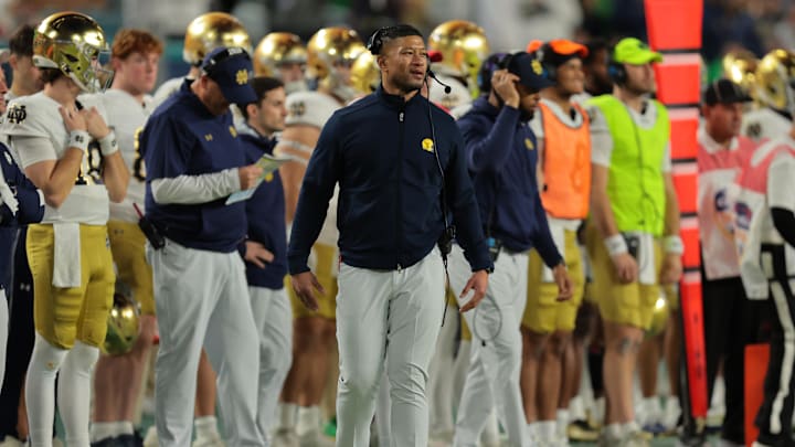 Jan 9, 2025; Miami, FL, USA; Notre Dame Fighting Irish head coach Marcus Freeman reacts in the second half against the Penn State Nittany Lions in the Orange Bowl at Hard Rock Stadium. Mandatory Credit: Sam Navarro-Imagn Images