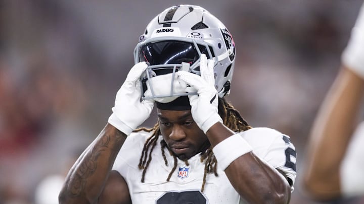 Aug 23, 2025; Glendale, Arizona, USA; Las Vegas Raiders running back Ashton Jeanty (2) against the Arizona Cardinals during a preseason NFL game at State Farm Stadium. Mandatory Credit: Mark J. Rebilas-Imagn Images