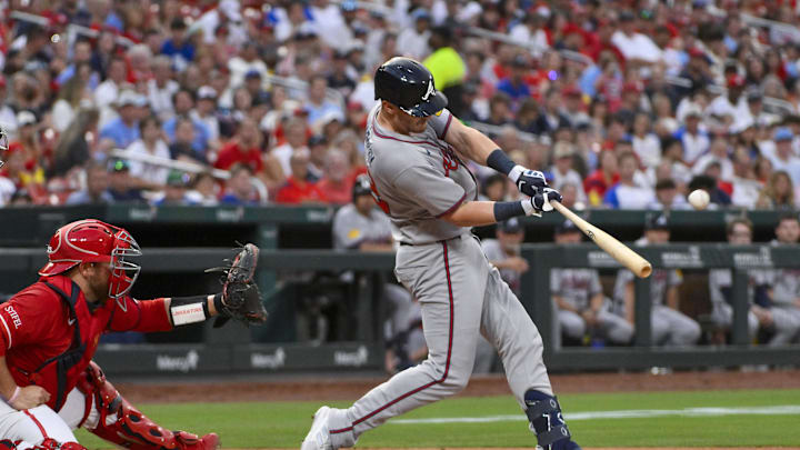 Jul 11, 2025; St. Louis, Missouri, USA;  Atlanta Braves designated hitter Sean Murphy (12) hits a solo home run against the St. Louis Cardinals during the third inning at Busch Stadium. Mandatory Credit: Jeff Curry-Imagn Images