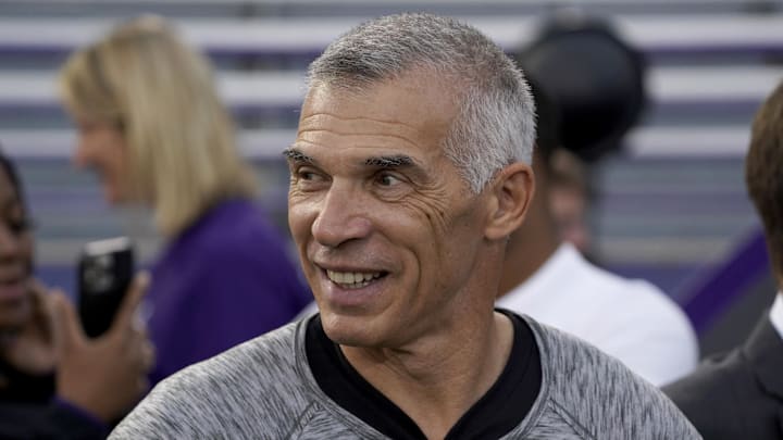Evanston, Illinois, USA; Former New York Yankees manager and Northwestern Wildcats alum Joe Girardi on the sidelines before a game between the Northwestern Wildcats and the Miami (Ohio) Redhawks at Ryan Field. 