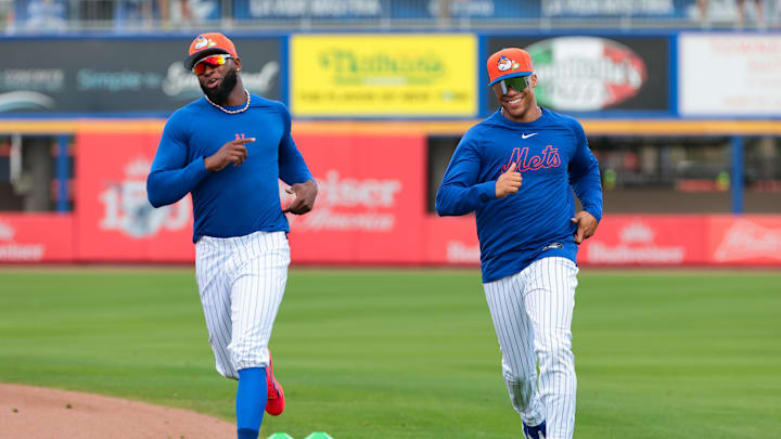 Feb 17, 2026; Port St. Lucie, FL, USA; New York Mets outfielder Luis Robert Jr. (left) and outfielder Juan Soto (right) run during a spring training workout at Clover Park. Mandatory Credit: Sam Navarro-Imagn Images