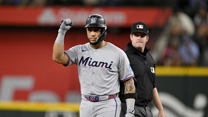 Miami Marlins hitter Agustin Ramirez fist pump towards dugout 