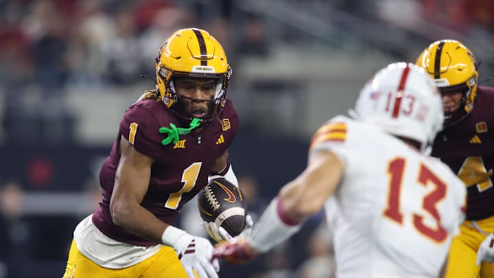 Dec 7, 2024; Arlington, TX, USA; Arizona State Sun Devils defensive back Keith Abney II (1) runs with the ball after intercepting a pass against the Iowa State Cyclones in the third quarter at AT&T Stadium. Mandatory Credit: Tim Heitman-Imagn Images