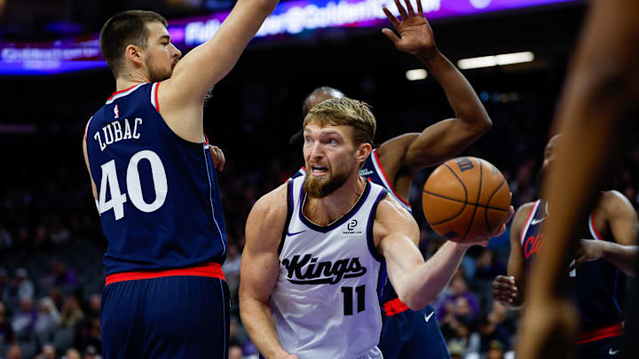 Oct 15, 2025; Sacramento, California, USA; Sacramento Kings center Domantas Sabonis (11) looks to pass the ball against Los Angeles Clippers center Ivica Zubac (40) during the first quarter at Golden 1 Center. Mandatory Credit: Sergio Estrada-Imagn Images Oct 15, 2025; Sacramento, California, USA; Sacramento Kings center Domantas Sabonis (11) looks to pass the ball against Los Angeles Clippers center Ivica Zubac (40) during the first quarter at Golden 1 Center. Mandatory Credit: Sergio Estrada-Imagn Images