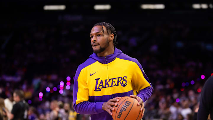 Oct 28, 2024; Phoenix, Arizona, USA; Los Angeles Lakers guard Bronny James against the Phoenix Suns at Footprint Center. Mandatory Credit: Mark J. Rebilas-Imagn Images Oct 28, 2024; Phoenix, Arizona, USA; Los Angeles Lakers guard Bronny James against the Phoenix Suns at Footprint Center. Mandatory Credit: Mark J. Rebilas-Imagn Images