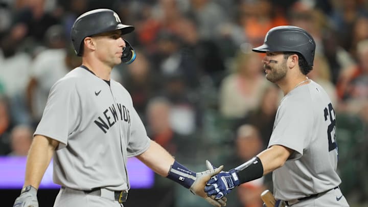 Baltimore, Maryland, USA; New York Yankees first baseman Paul Goldschmidt (48) greeted by catcher Austin Wells (28) after scoring in the eighth inning against the Baltimore Orioles at Oriole Park at Camden Yards.