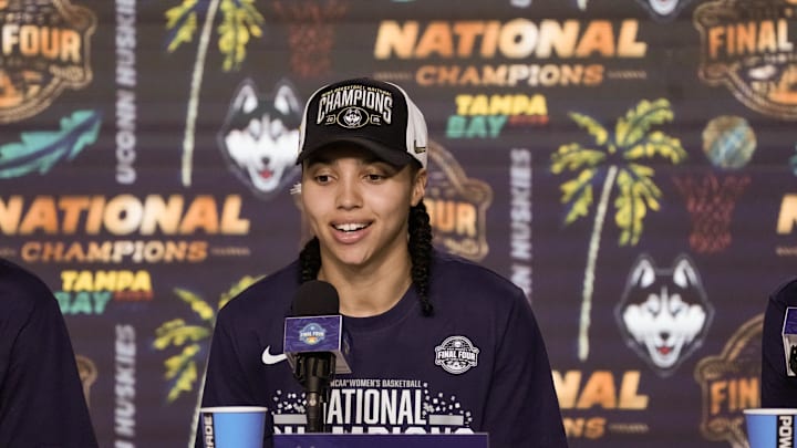 Apr 6, 2025; Tampa, FL, USA; Connecticut Huskies guard Azzi Fudd (35) speaks to the media after the national championship of the women's 2025 NCAA tournament against the South Carolina Gamecocks at Amalie Arena. Mandatory Credit: Kirby Lee-Imagn Images