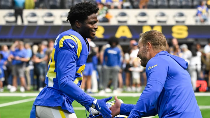 Oct 6, 2024; Inglewood, California, USA; Los Angeles Rams head coach Sean McVay greets cornerback Darious Williams (24) before an NFL game against the Green Bay Packers at SoFi Stadium. Mandatory Credit: Robert Hanashiro-Imagn Images