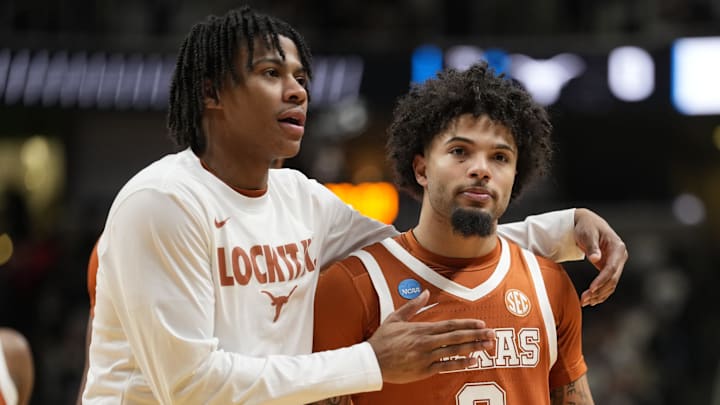 Jordan Pope (right) helped Texas put up a spirited fight against Purdue. Jordan Pope (right) helped Texas put up a spirited fight against Purdue.
