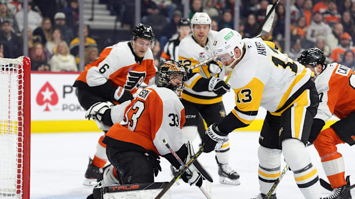 Feb 8, 2025; Philadelphia, Pennsylvania, USA; Philadelphia Flyers goalie Samuel Ersson (33) makes a save against Pittsburgh Penguins right wing Kevin Hayes (13) in the third period at Wells Fargo Center. Mandatory Credit: Kyle Ross-Imagn Images